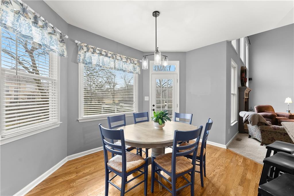 1070 Coleridge Way Suwanee, GA 30024 - Photo 22 of 98 a view of a dining room with furniture window and outside view