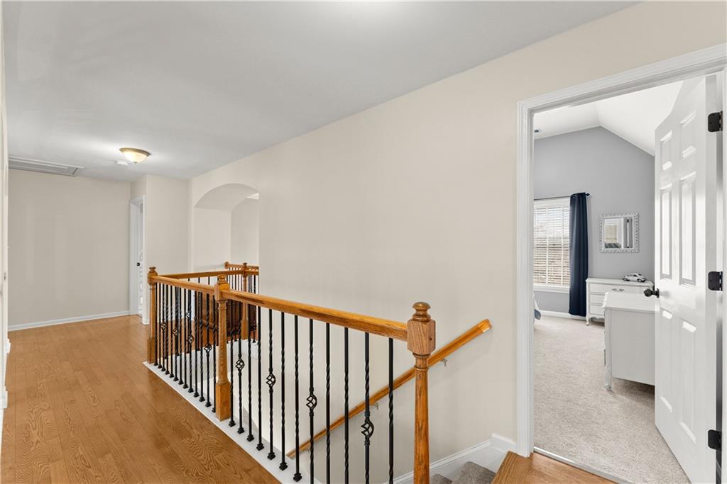 1070 Coleridge Way Suwanee, GA 30024 - Photo 35 of 98 a view of a hallway with windows