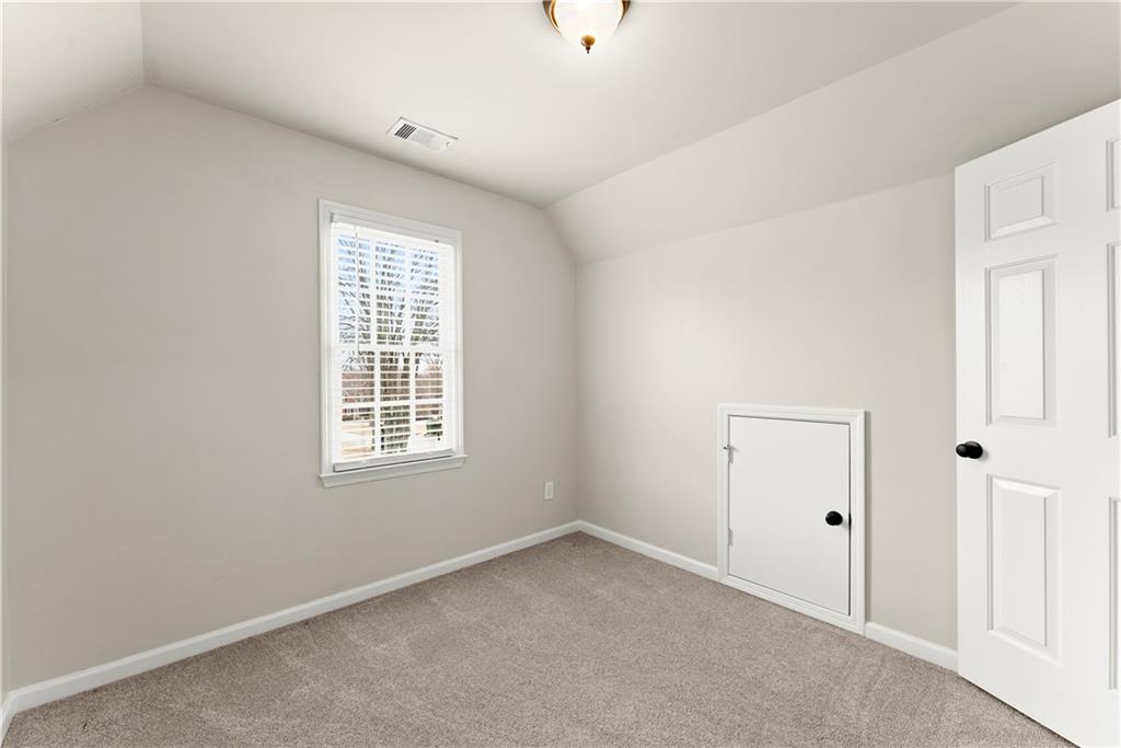 1070 Coleridge Way Suwanee, GA 30024 - Photo 36 of 76 an empty room with a window