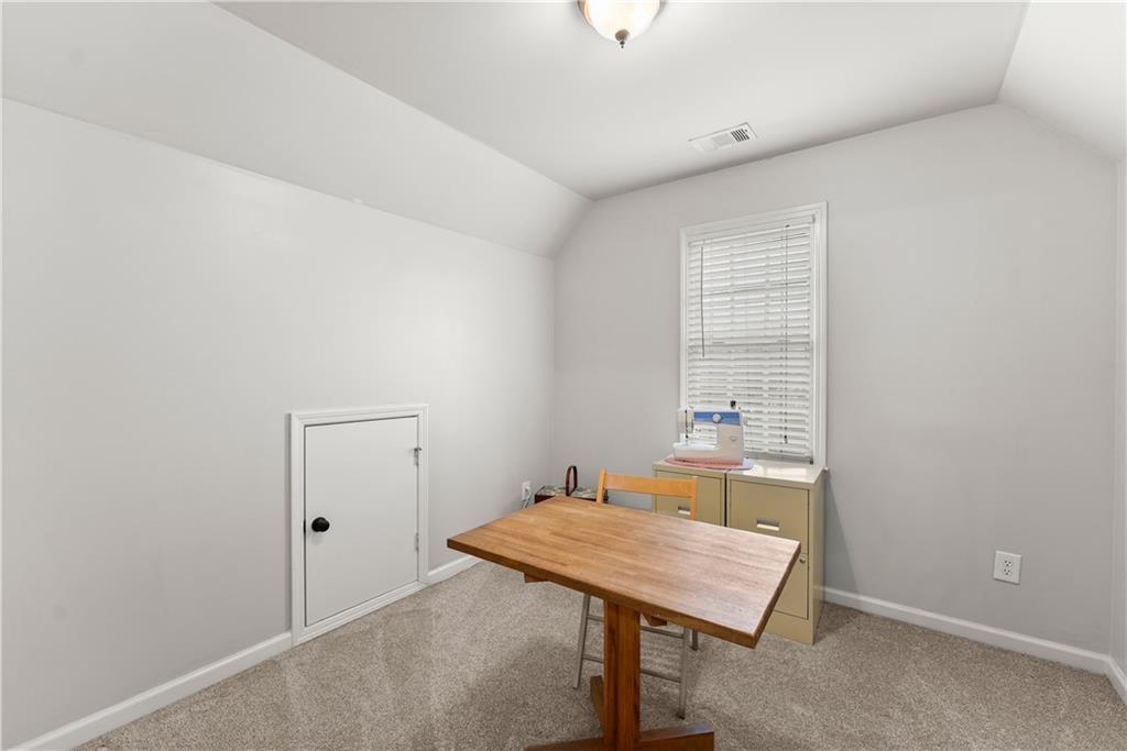 1070 Coleridge Way Suwanee, GA 30024 - Photo 46 of 98 a view of a room with a table and chairs