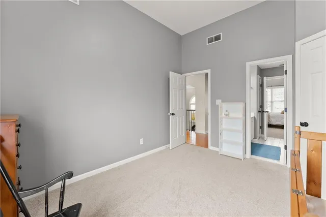 an aerial view of a house with outdoor space