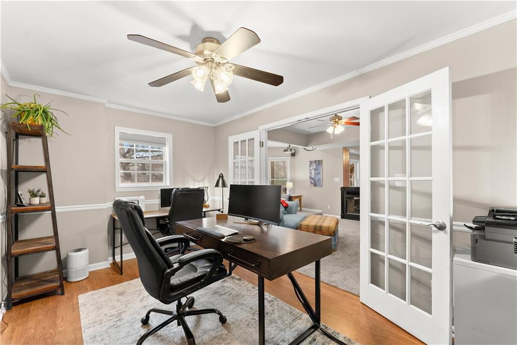 1070 Coleridge Way Suwanee, GA 30024 - Photo 57 of 98 a view of a workspace with furniture and a window