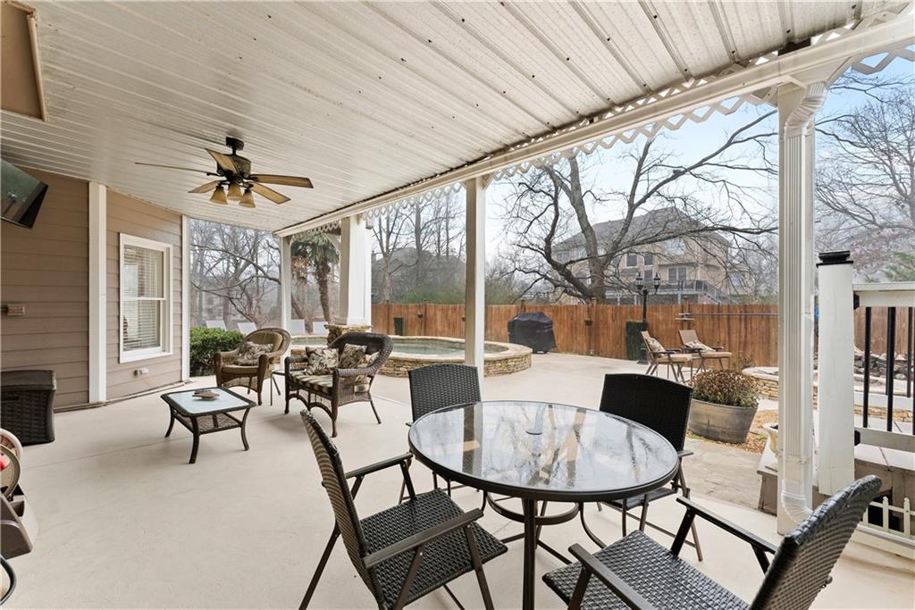 1070 Coleridge Way Suwanee, GA 30024 - Photo 65 of 98 a view of a dining room with furniture window and outside view