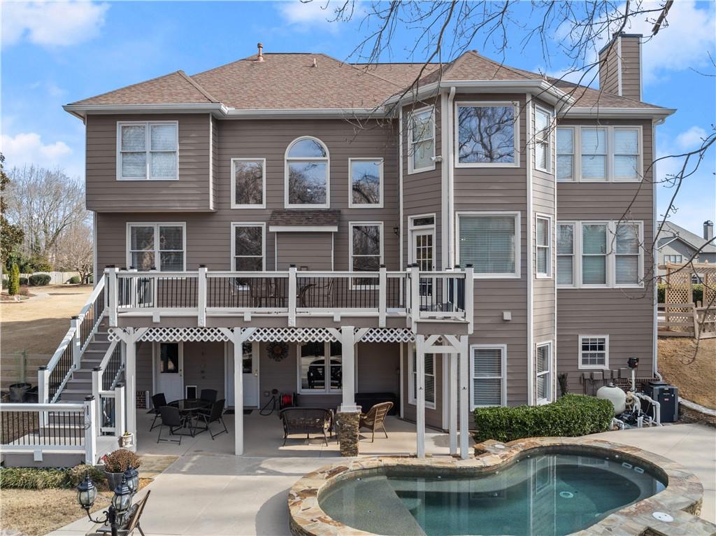 1070 Coleridge Way Suwanee, GA 30024 - Photo 69 of 98 a front view of building with street view and seating space