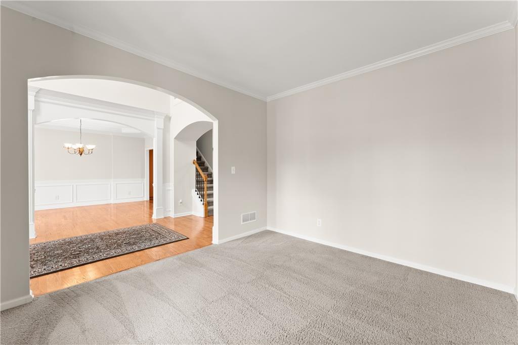 1070 Coleridge Way Suwanee, GA 30024 - Photo 7 of 76 a view of an empty room and glass door