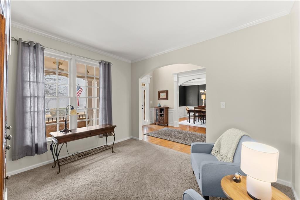 1070 Coleridge Way Suwanee, GA 30024 - Photo 8 of 98 a living room with furniture and a large window