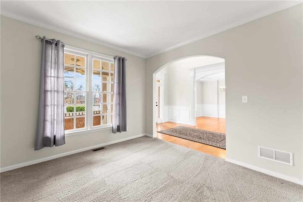 1070 Coleridge Way Suwanee, GA 30024 - Photo 8 of 76 a view of a room with large windows