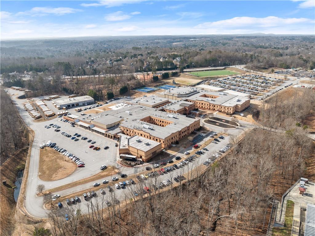 1070 Coleridge Way Suwanee, GA 30024 - Photo 92 of 98 an aerial view of residential houses with outdoor space