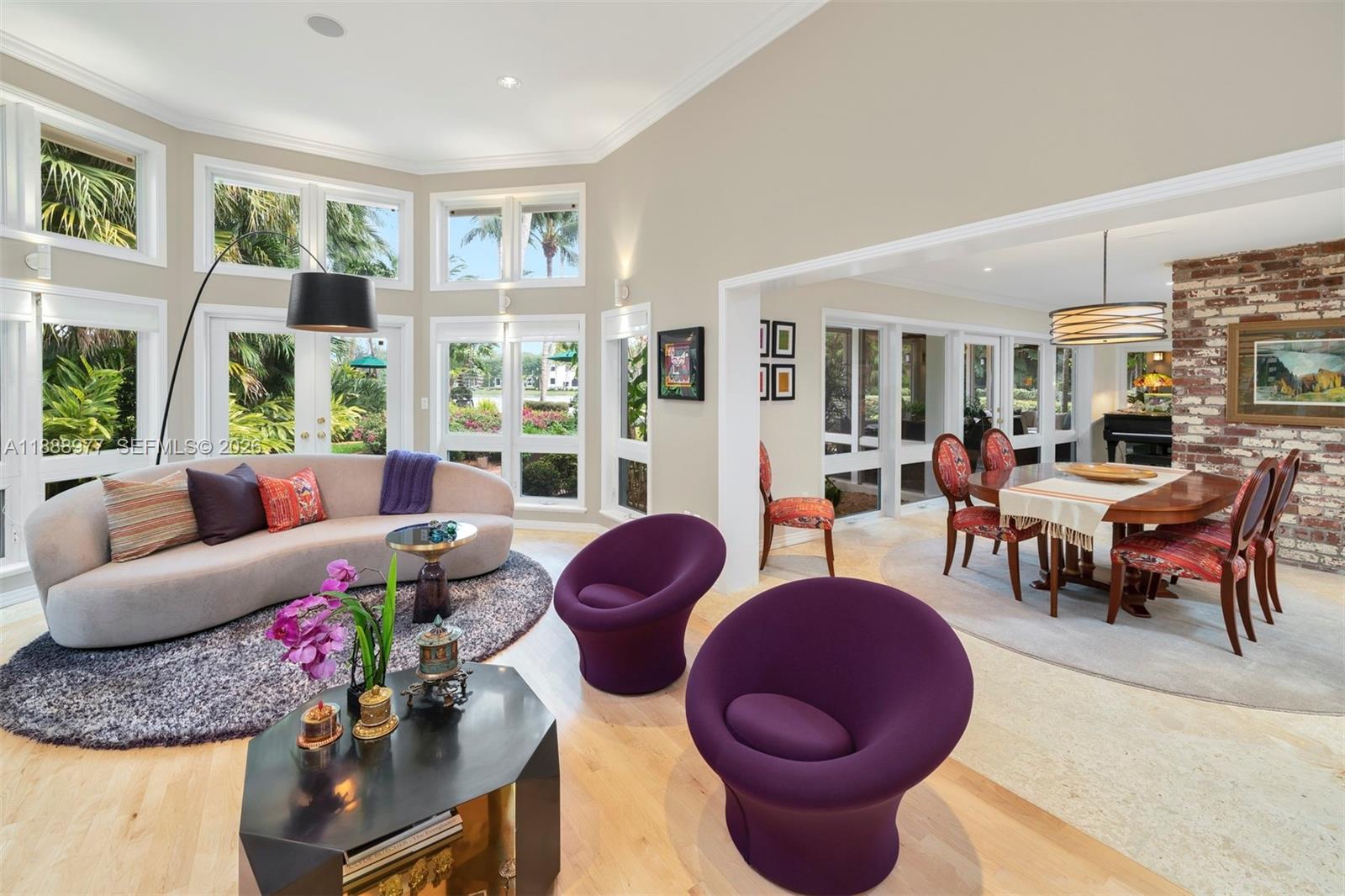 8845 School House Road Coral Gables, FL 33156 - Photo 12 of 23 a living room with furniture and a large window