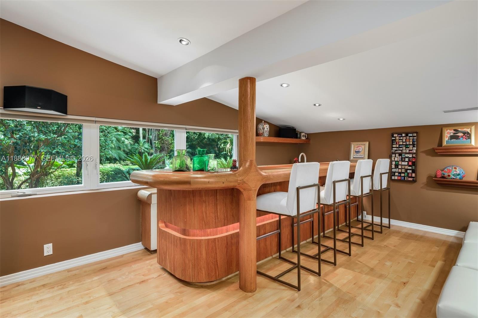8845 School House Road Coral Gables, FL 33156 - Photo 13 of 23 a living room with furniture and a large window