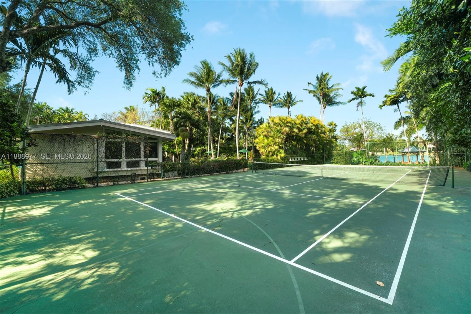 8845 School House Road Coral Gables, FL 33156 - Photo 21 of 23 a view of a tennis court