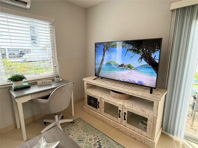 a view of table and chairs in living room