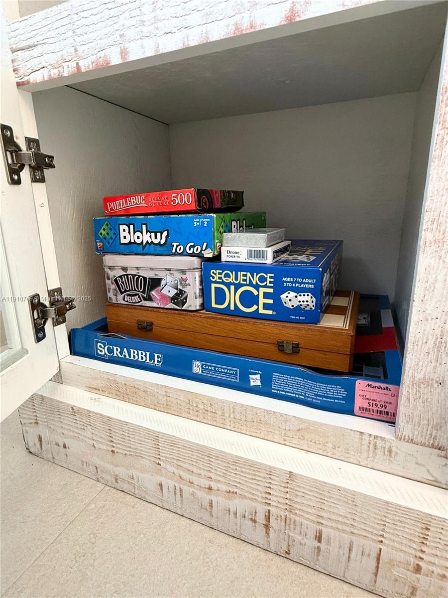1705 North Riverside Drive, Unit 1 Pompano Beach, FL 33062 - Photo 34 of 36 a view of a refrigerator in the kitchen