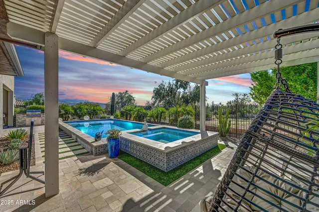 a view of a chairs and tables in the patio