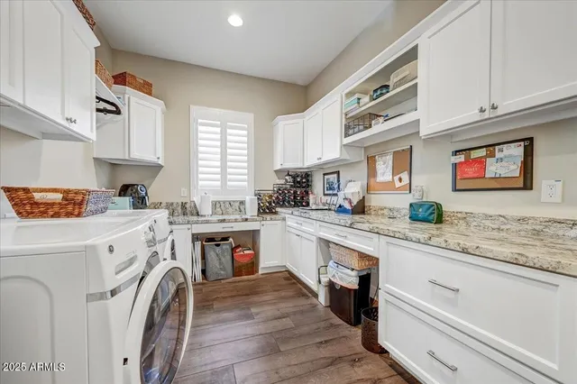 a view of balcony with wooden floor and potted plant