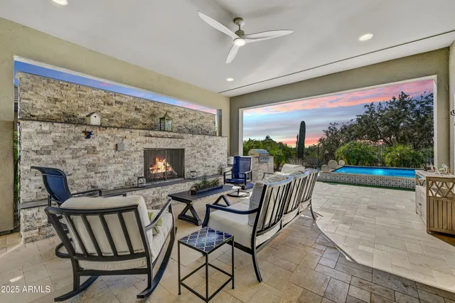 an aerial view of residential houses with outdoor space and river