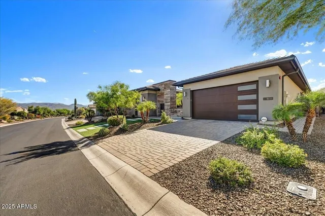 a house view with a garden space