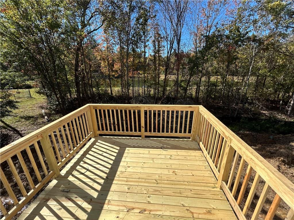 37 Mountain Chase Road Southwest Rome, GA 30165 - Photo 2 of 24 a view of balcony with wooden floor and fence