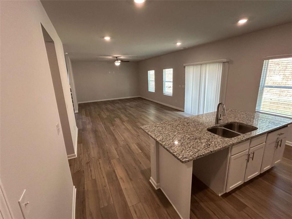 37 Mountain Chase Road Southwest Rome, GA 30165 - Photo 8 of 24 a kitchen with stainless steel appliances granite countertop a sink stove and refrigerator