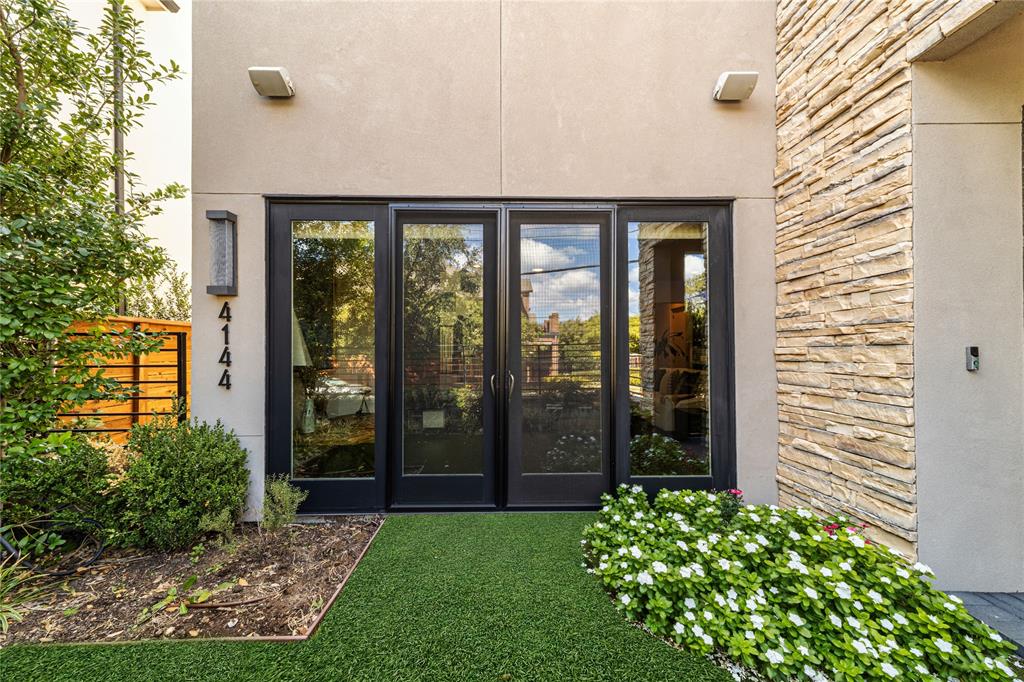 4144 Entrada Way Dallas, TX 75219 - Photo 13 of 31 Sliding Doors to the living room