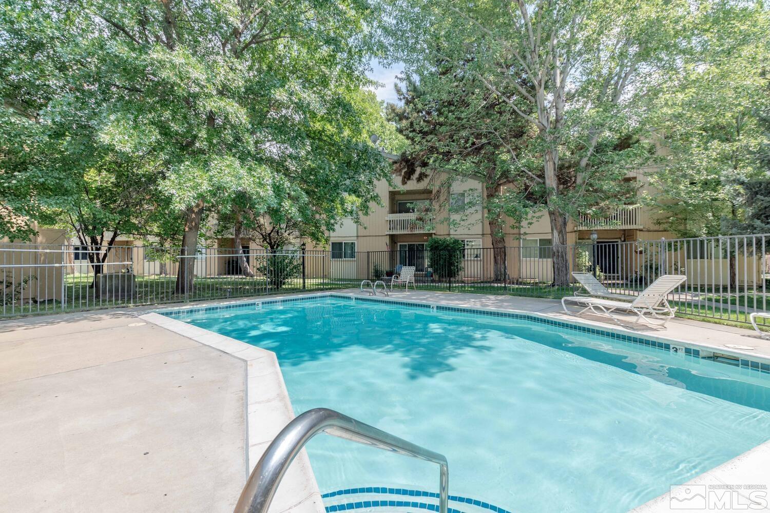 2300 Dickerson Road, Unit 73 Reno, NV 89503 - Photo 24 of 25 a view of a house with backyard and sitting area