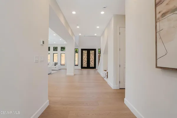 a kitchen with stainless steel appliances granite countertop a stove and a sink