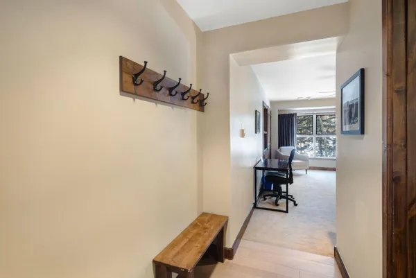 a bathroom with a bathtub shower sink and toilet