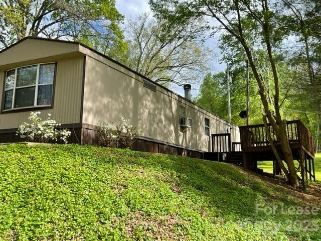 145 Merriman Road Statesville, NC 28625 - Photo 11 of 24 a view of a house with backyard