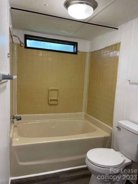 145 Merriman Road Statesville, NC 28625 - Photo 20 of 24 a bathroom with a toilet and a bathtub