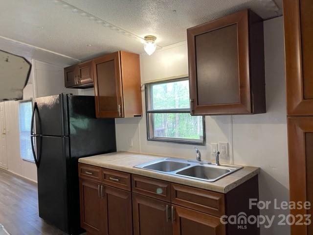 145 Merriman Road Statesville, NC 28625 - Photo 2 of 24 a kitchen with stainless steel appliances a refrigerator and a sink