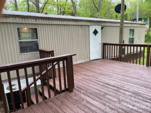 145 Merriman Road Statesville, NC 28625 - Photo 22 of 24 a view of a wooden deck