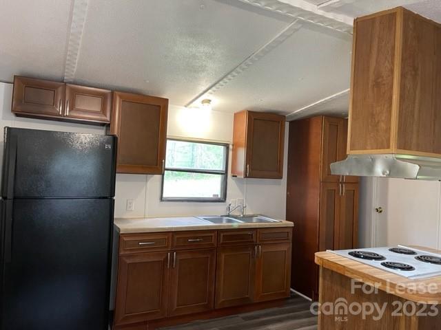 145 Merriman Road Statesville, NC 28625 - Photo 3 of 24 a kitchen with stainless steel appliances granite countertop a refrigerator and a sink