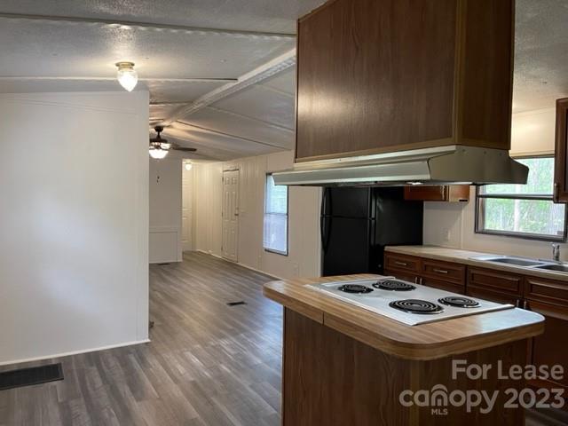 145 Merriman Road Statesville, NC 28625 - Photo 4 of 24 a kitchen that has a stove and a table
