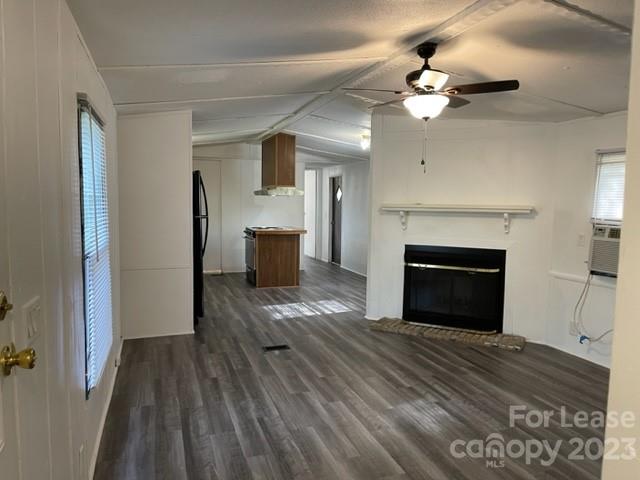 145 Merriman Road Statesville, NC 28625 - Photo 6 of 24 a view of a livingroom with a fireplace