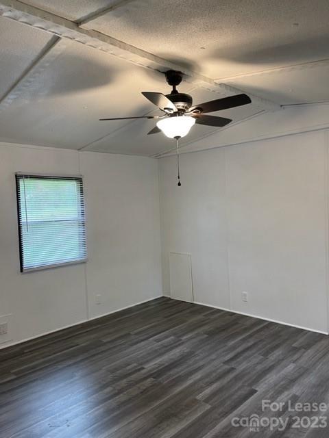 145 Merriman Road Statesville, NC 28625 - Photo 8 of 24 a view of a room with wooden floor a ceiling fan and closet
