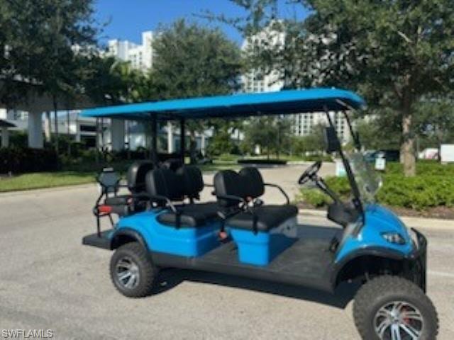 13945 Old Coast Road, Unit 905 Naples, FL 34110 - Photo 38 of 39 a view of backyard with deck and seating space