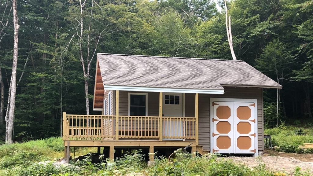 a house view with a garden