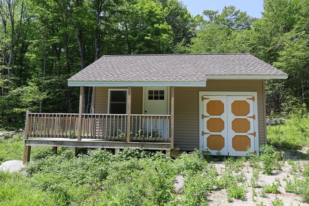 Lot 3 Yokum Pond Road Becket, MA 01223 - Photo 15 of 35 a view of a house with a yard