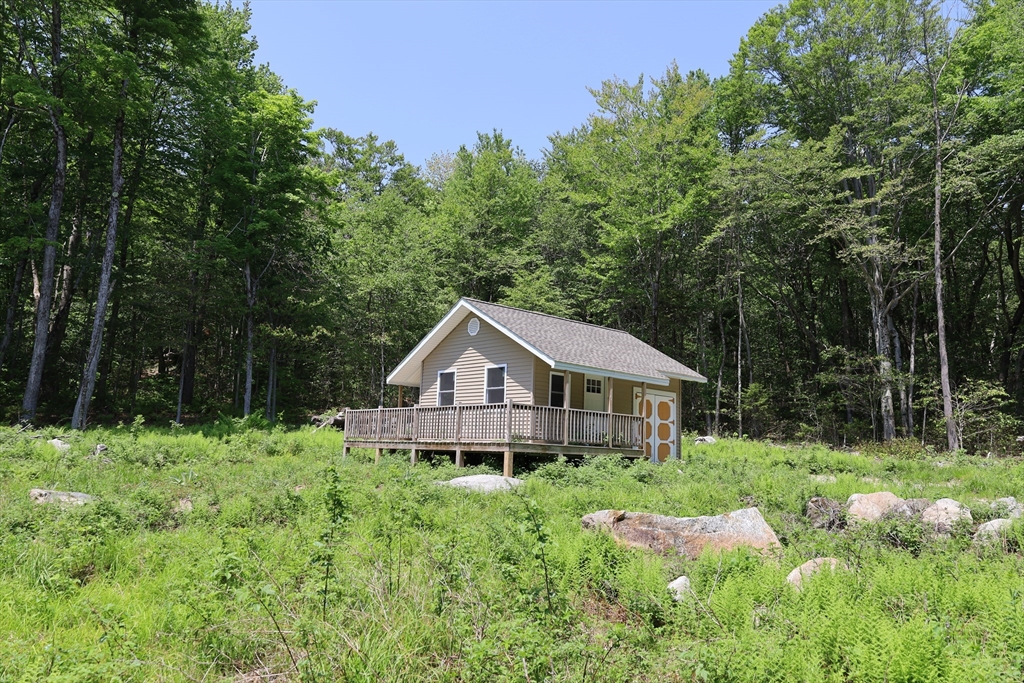 Lot 3 Yokum Pond Road Becket, MA 01223 - Photo 17 of 35 a house with trees in the background