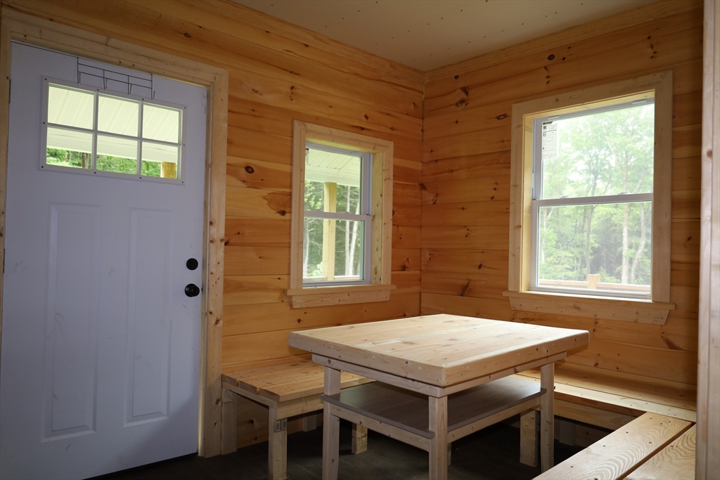 Lot 3 Yokum Pond Road Becket, MA 01223 - Photo 21 of 35 a bath room with a table and a window