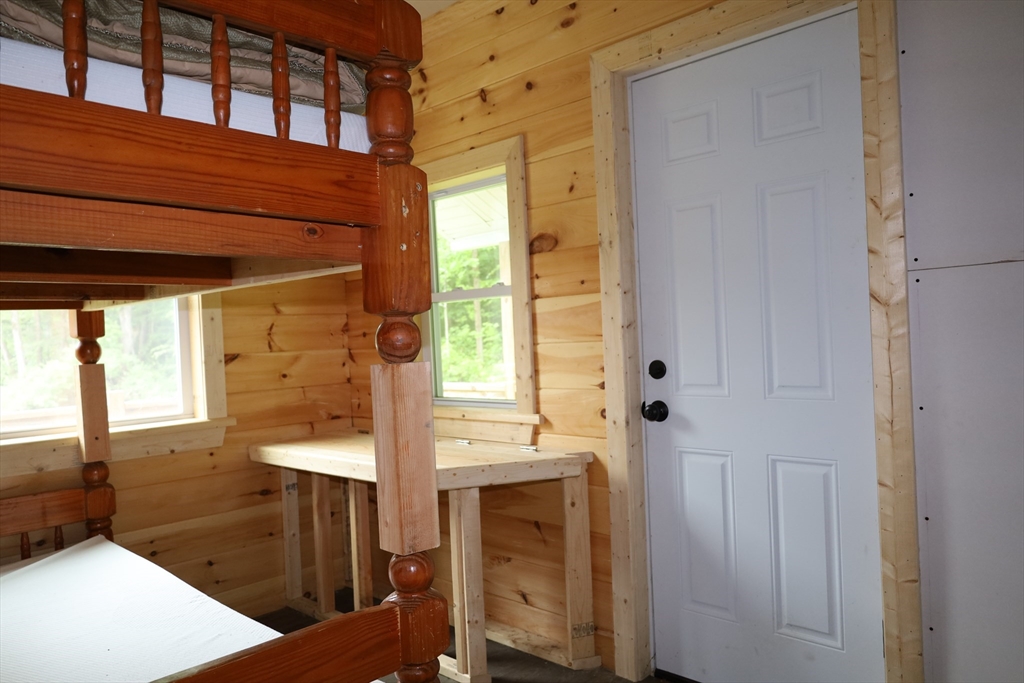 Lot 3 Yokum Pond Road Becket, MA 01223 - Photo 22 of 35 a bathroom with a sink and a mirror