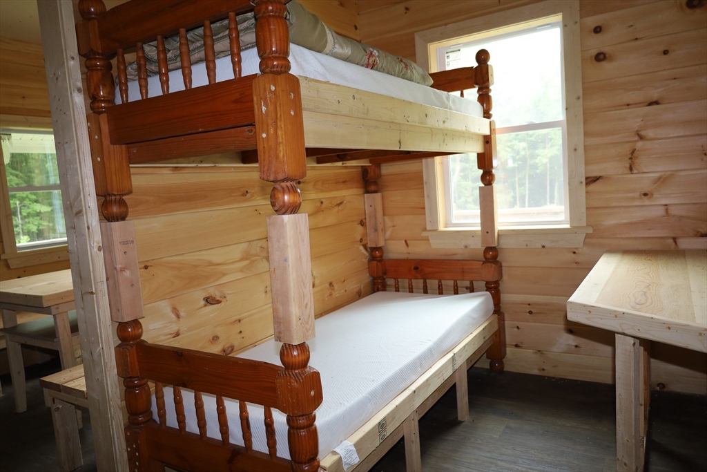 Lot 3 Yokum Pond Road Becket, MA 01223 - Photo 23 of 35 a bedroom with a bed and a window