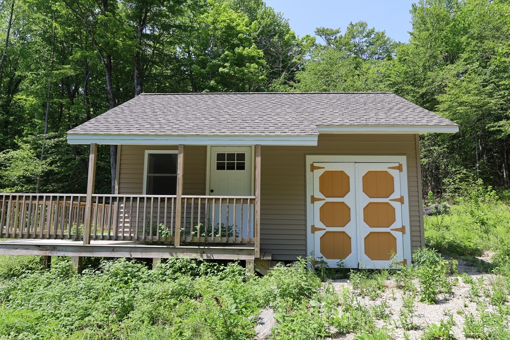 Lot 3 Yokum Pond Road Becket, MA 01223 - Photo 10 of 35 a view of a house with a yard