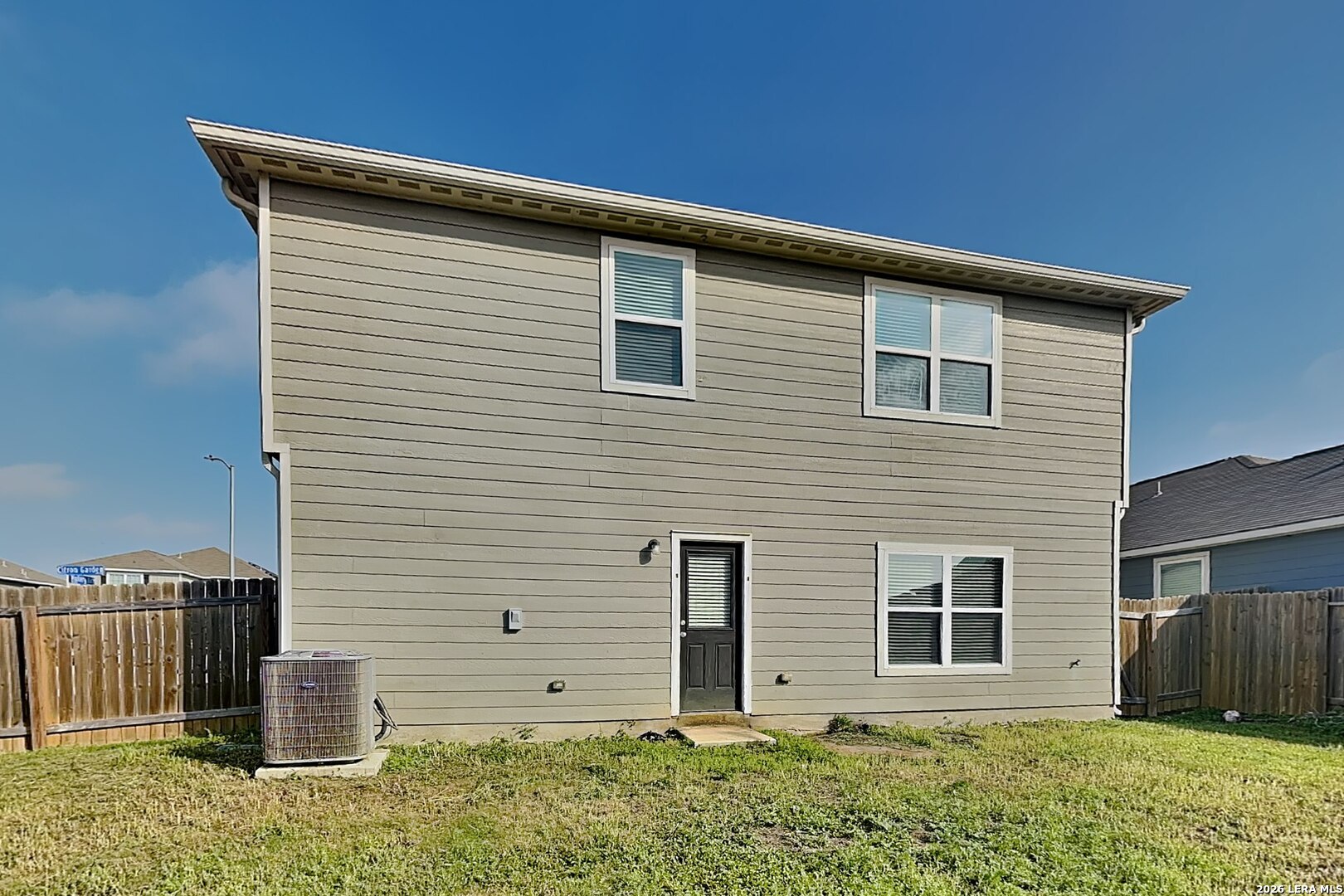 3022 Citron Garden Converse, TX 78109 - Photo 19 of 21 a view of a house with a yard