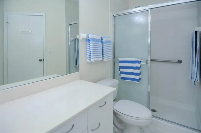 a bathroom with a sink and toilet