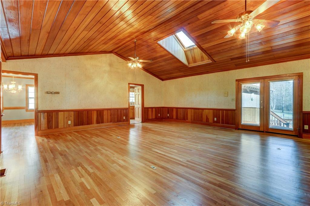 761 Hudson Road Summerfield, NC 27358 - Photo 4 of 28 Another view of the Great Room. Four floor outlets provide flexibility for furniture placement. French doors to deck.