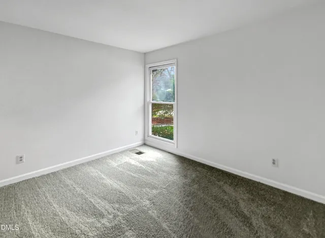 an empty room with window