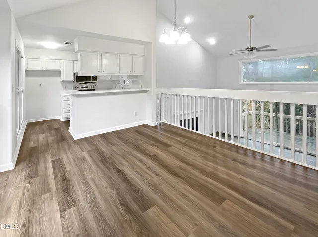 a view of a kitchen from the hallway