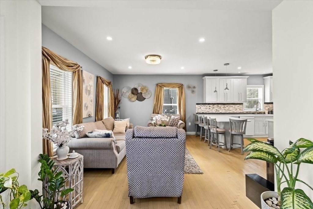 6 Arion Street Boston, MA 02125 - Photo 8 of 42 a living room with furniture and a large window