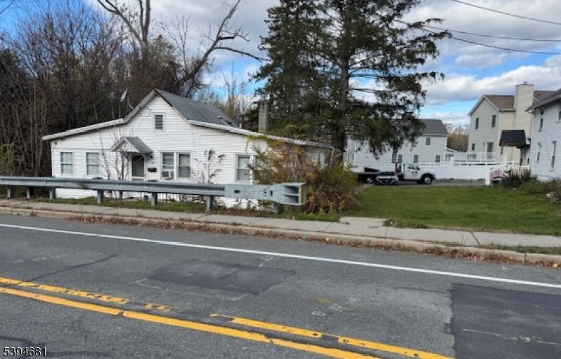 118 Main Street Sparta, NJ 07871 - Photo 2 of 4 front view of house with a street